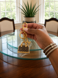LV MONGRAMMED ALMA BAG KEYCHARM GOLDTONE