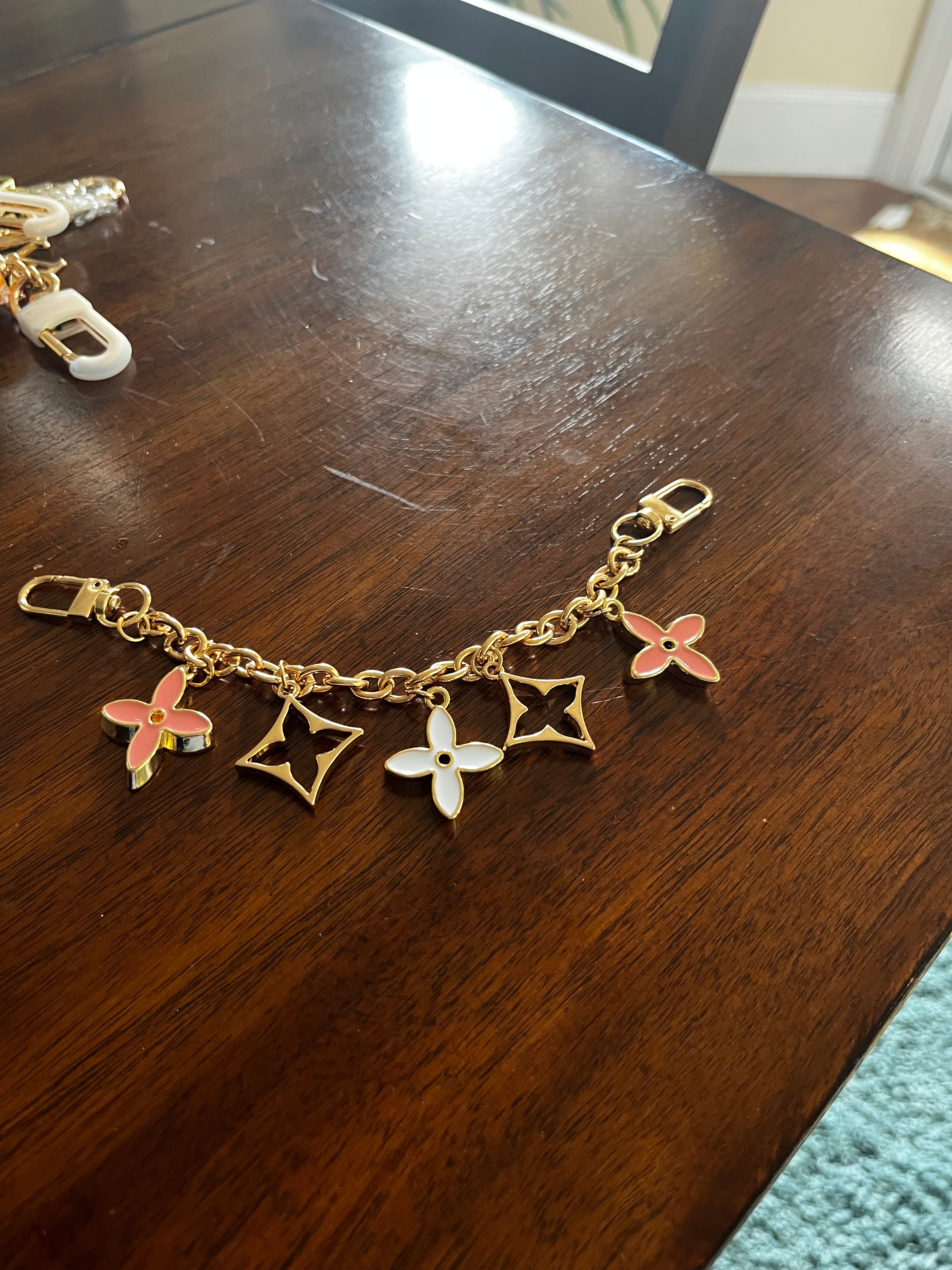 GOLD PURSE CHAIN PINK AND WHITE FLOWERS
